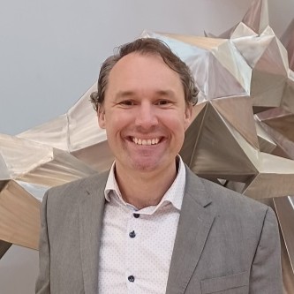 Headshot of Dr. Thomas Theis